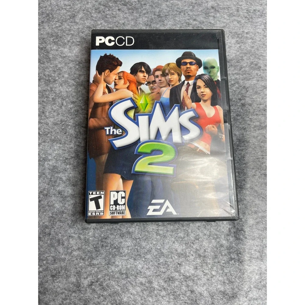 The Sims 2 PC CD-ROM Video Game 4-Disc Set with‎ Manual EA Includes Serial Code
